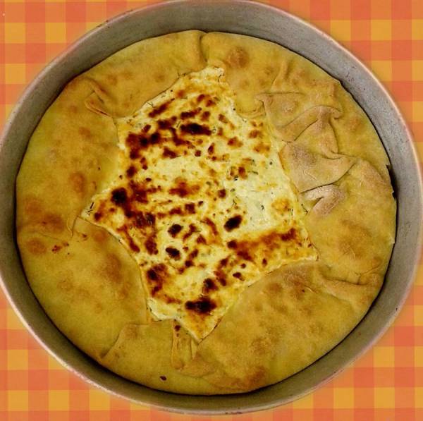 Ανοιχτή μανιάτικη τυρόπιτα