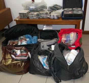 Σύλληψη 6 Αφρικανών για παράνομα CD και DVD