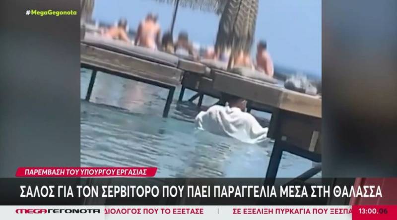 Ρόδος: Σάλος για τον σερβιτόρο που πάει παραγγελία μέσα στη θάλασσα - Παράνομη η κατασκευή στην παραλία (Βίντεο)